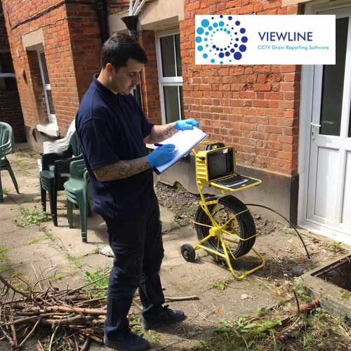 Blast Away Staff Member With Clipboard Filling Out CCtv Drain Survey Form